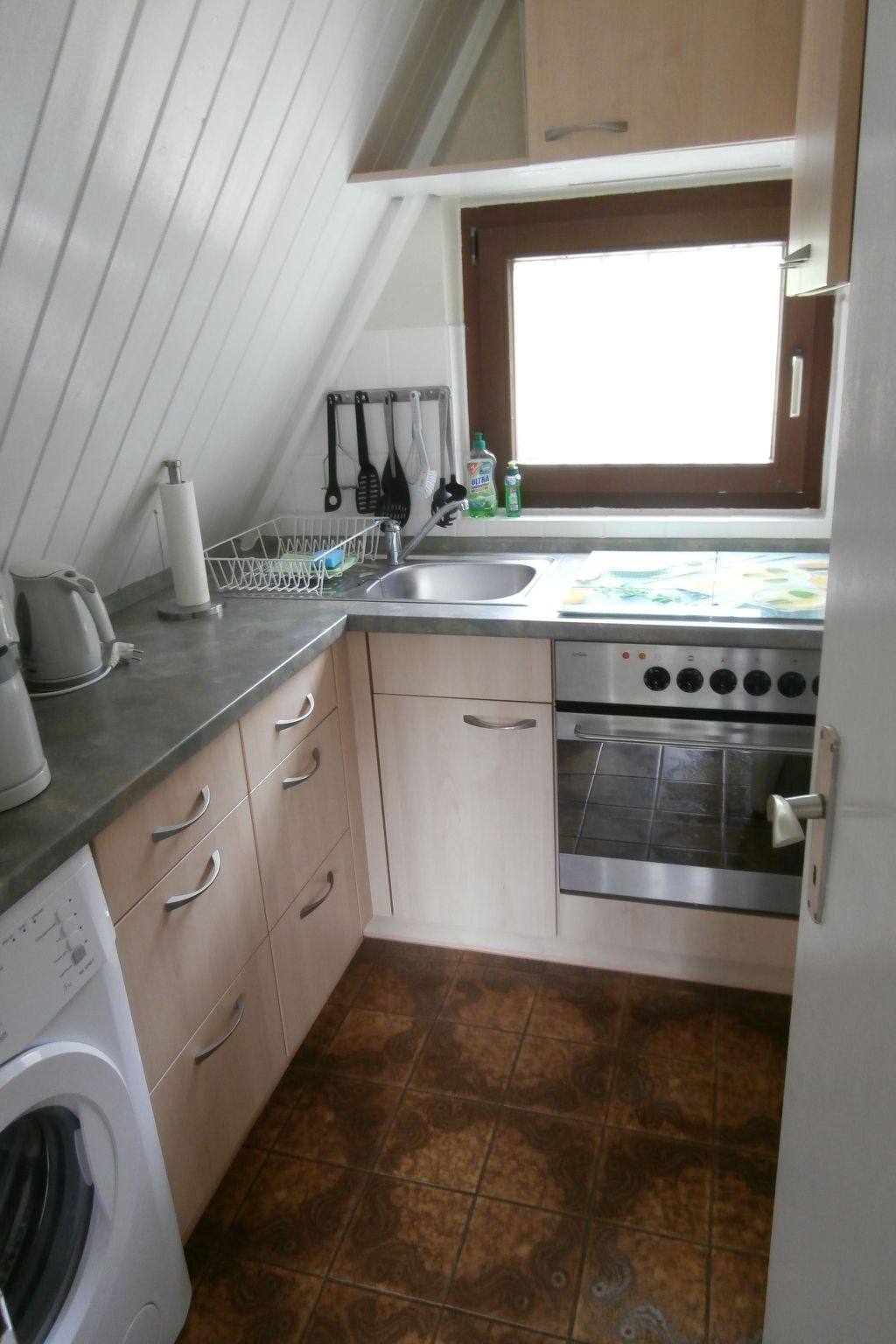 Uriges Ferienhaus mit Garten und Grill-Drinnen