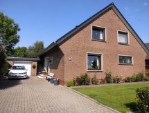 Vrijstaand vakantiehuis bij zee in Burhave – 2 slaapkamers & tuin - thumbnail 1