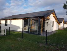 Vrijstaande bungalow met omheinde tuin op 100 meter van de Noordzee - thumbnail 1