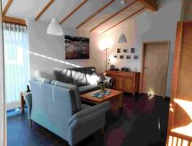 Vrijstaande bungalow met omheinde tuin op 100 meter van de Noordzee - thumbnail 3