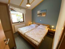 Omheinde vakantiebungalow nabij strand en meer in Burhave, 6 personen - thumbnail 6
