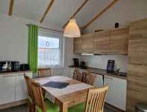 Vrijstaande nieuwbouw bungalow op 400m van zee met tuinhuis in Burhave - thumbnail 4
