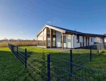 Omheinde bungalow bij de Noordzee met infraroodcabine, 400m van strand - thumbnail 1