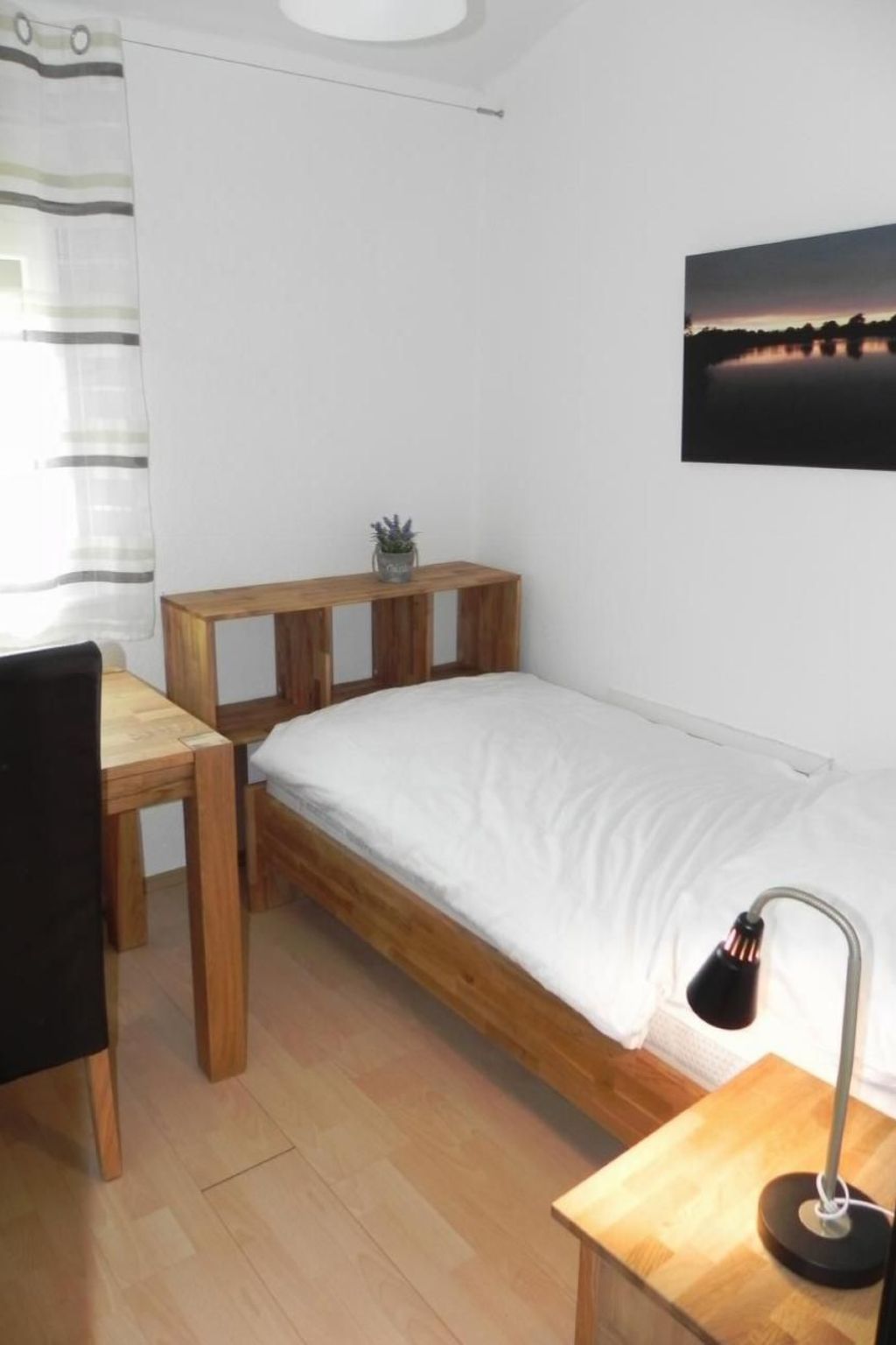 Freistehendes Ferienhaus in 2.Reihe am See-Drinnen