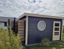 Vrijstaande vakantiebungalow met eigen sauna en tuin, 400m van het strand in Burhave - thumbnail 4