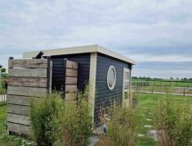 Vrijstaande vakantiebungalow met eigen sauna en tuin, 400m van het strand in Burhave - thumbnail 5