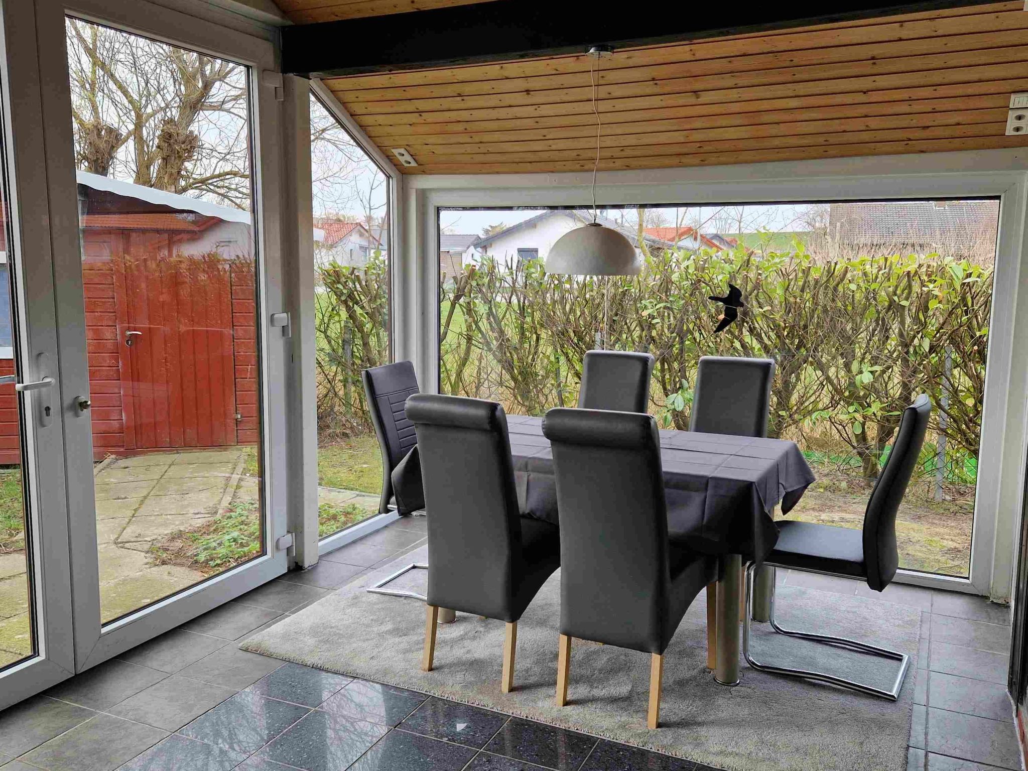 L21 Ferienhaus mit Wintergarten und Holzterrasse