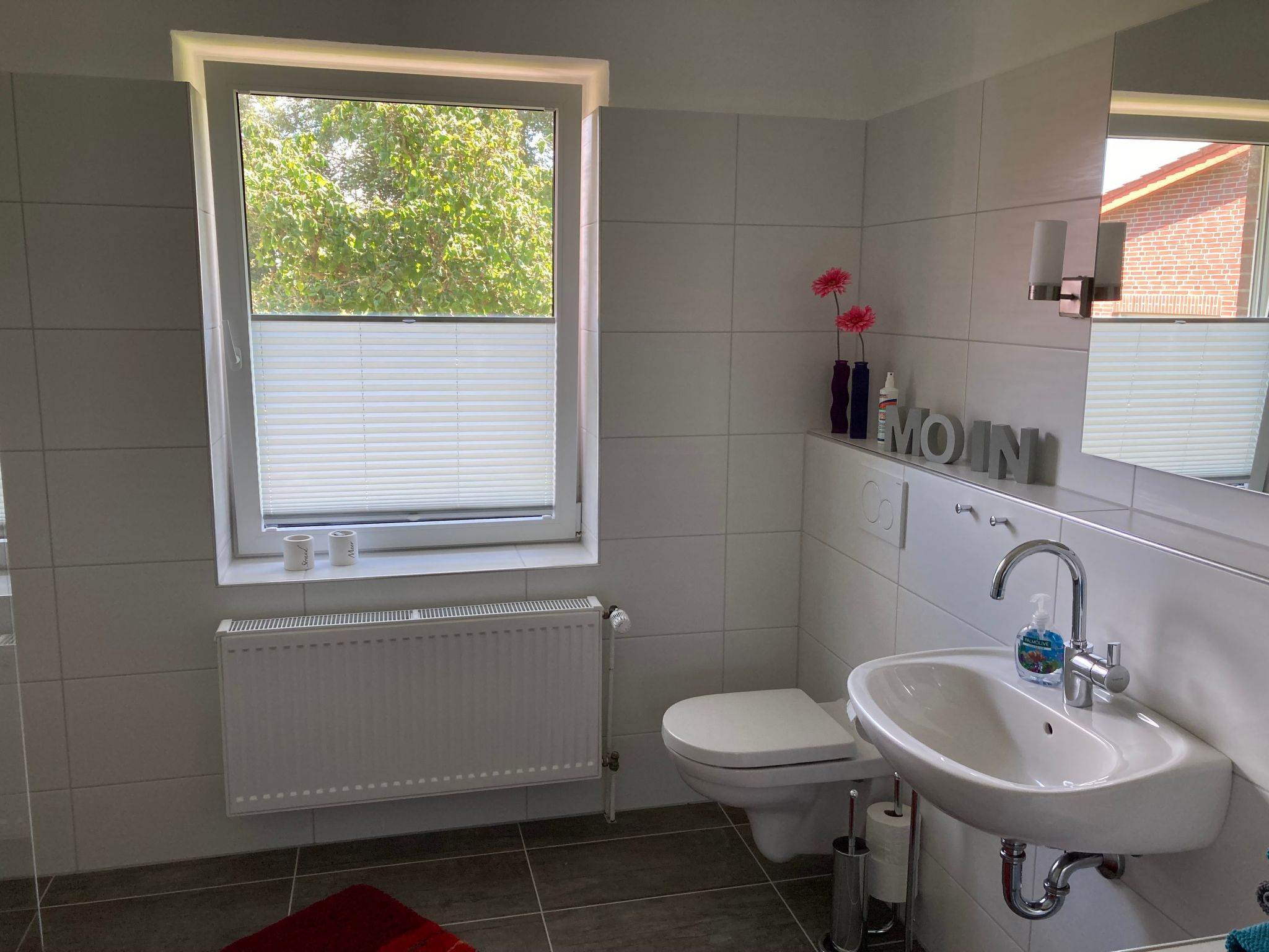 Mit kleinem Garten und Grill-Binnen