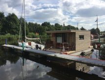 Romantisch Hausboot voor 2 aan de Noordzee met knusse open haard - thumbnail 2