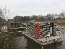 Romantisch Hausboot voor 2 aan de Noordzee met knusse open haard - thumbnail 4