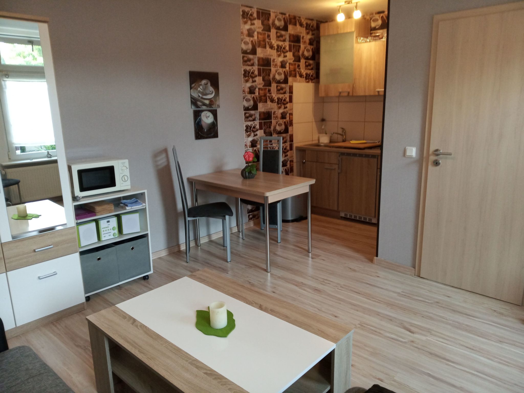Appartement mit Garten, Grill und Terrasse-Drinnen