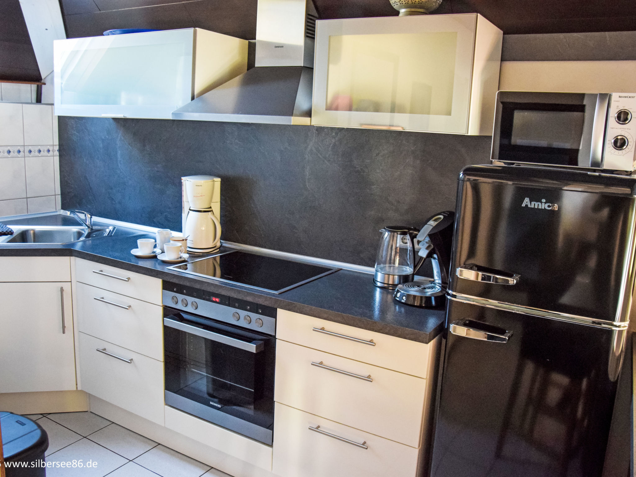 Maison mit Hot Tub – Cuisine et coin repas, photo 6 sur 47