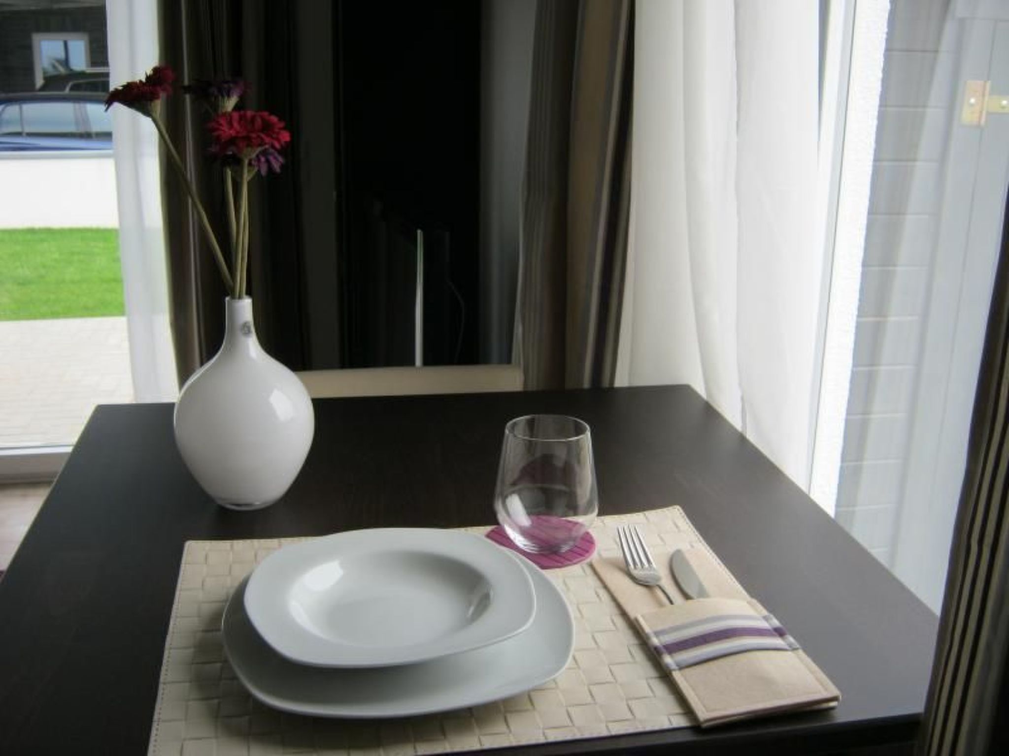 Wohnung im Erdgeschoss mit Terrasse und Stellplatz