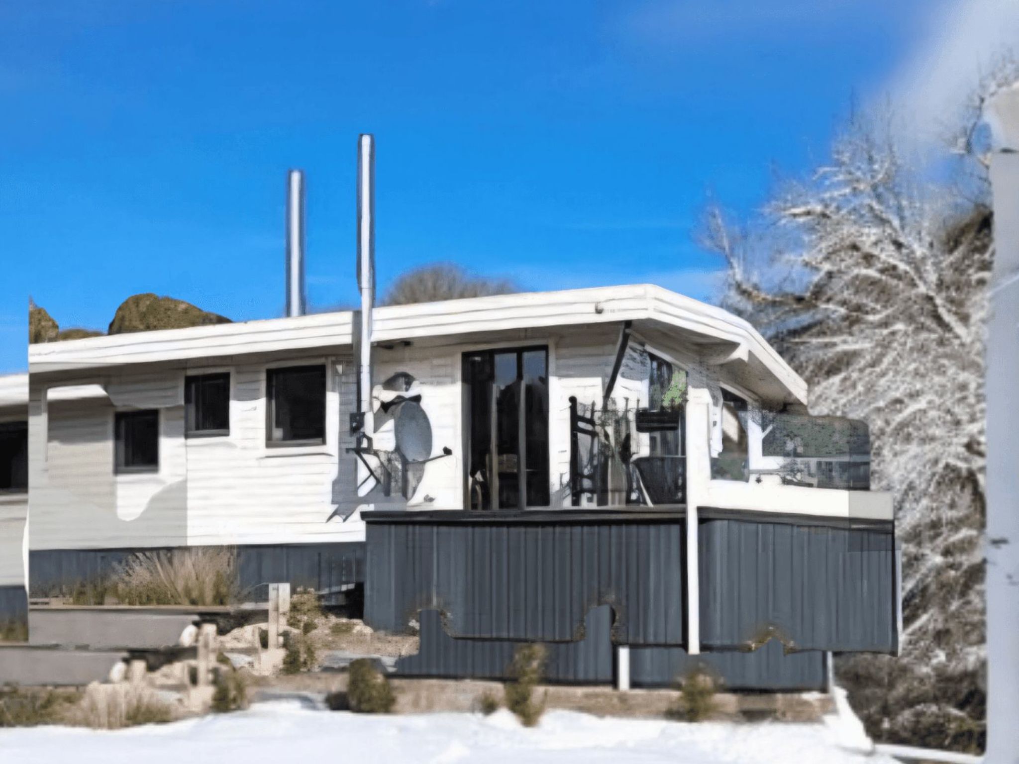 "Wilsumer Berge Resort - Traumland", chalet 2-kamers 25 m2, op de begane grond. Het objekt is geschikt voor 2 volwassenen + 2 kinderen. 1 kamer met 1 2-pers bed. 1 kamer met 1 x 2 stapelbedden. Douche..