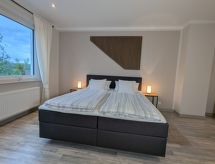 Modern appartement aan de bosrand in Irmenach met tuin, vlakbij golfbaan - thumbnail 4