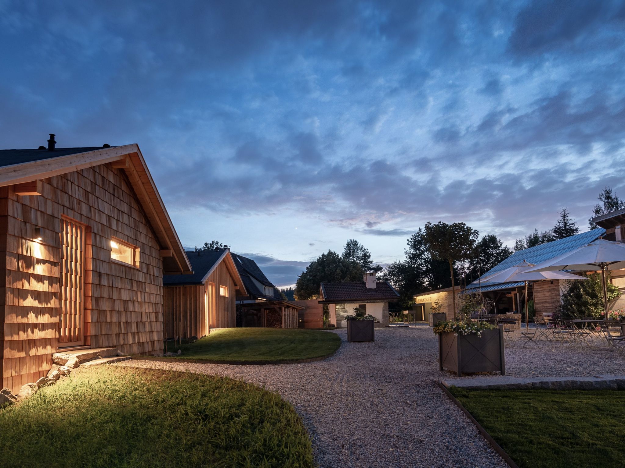 SPACE FOR VALUABLE TIME Simple and clear - on the outside, in the tradition of shelters for people who have called the forest home for centuries and used it to earn a living - regionally localised - w..