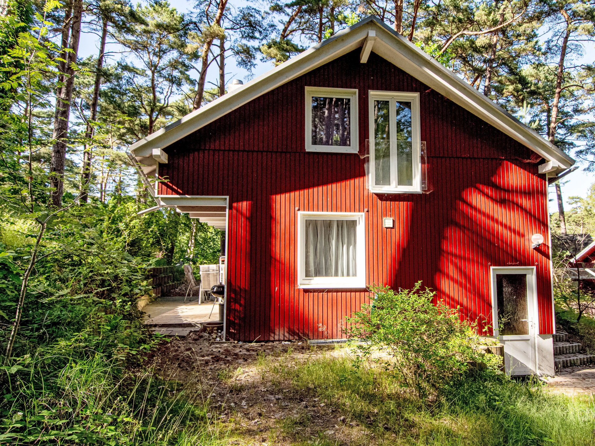 Strandnahes Ferienhaus Dünenperle mit Kamin - Buiten