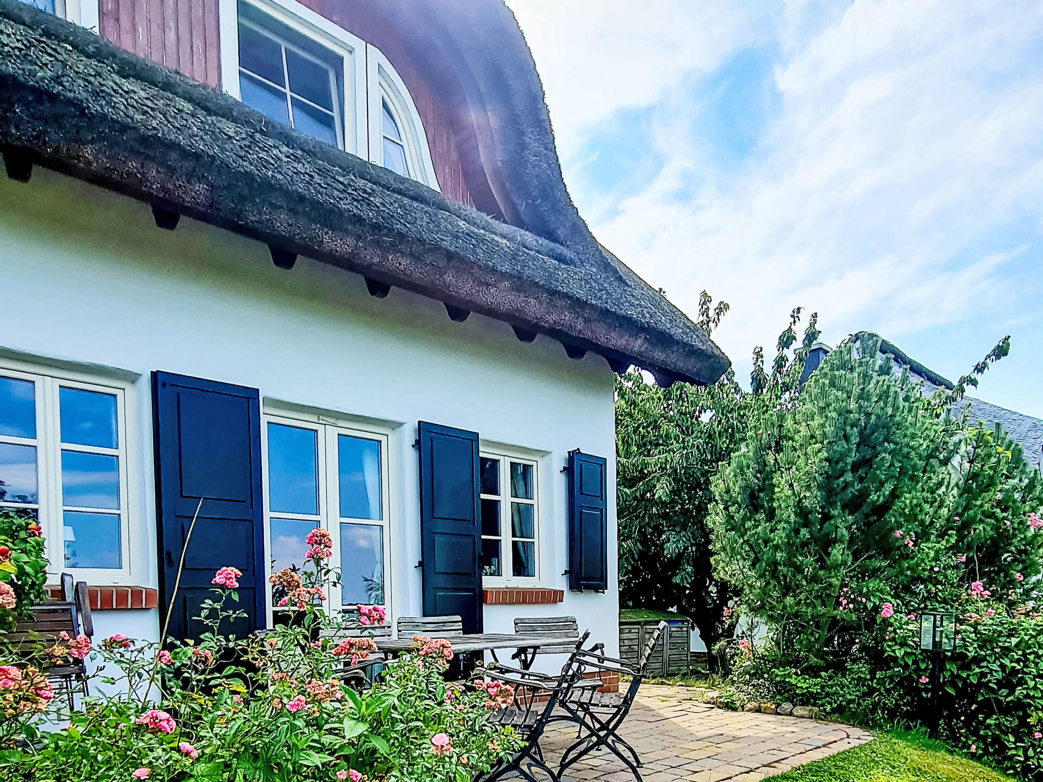Traditionelles Reetdachhaus mit Sauna, Kaminofen