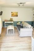 Vrijstaande bungalow bij de Oostzee op Rügen met open haard en tuin - thumbnail 4