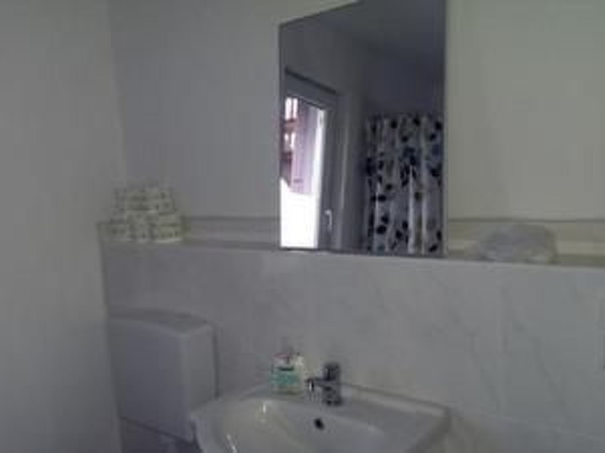 In Vorland mit Grill und Garten-Dedans