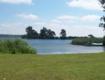 Vrijstaande bungalow aan de Plauer See met eigen tuin en bbq - thumbnail 4