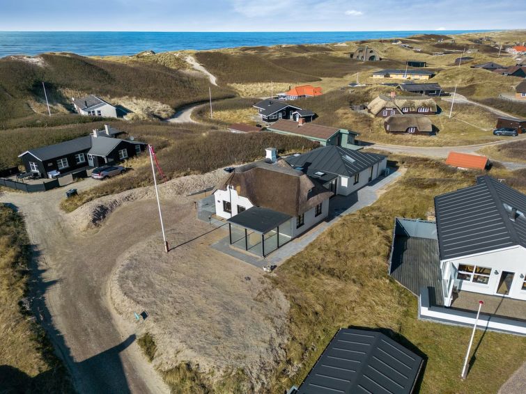 Aan zee: Ruim vakantiehuis in Ringkøbing met whirlpool en open haard in Ringkøbing