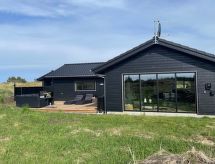 Vrijstaande designwoning met sauna, laadpaal en wilde tuin op 1,2 km van zee - thumbnail 3