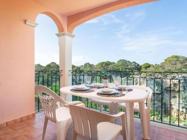 Observer's Retreat in Cala Pi: Zeezicht, Airco & Smart TV op 250m van het Strand in Cala Pi