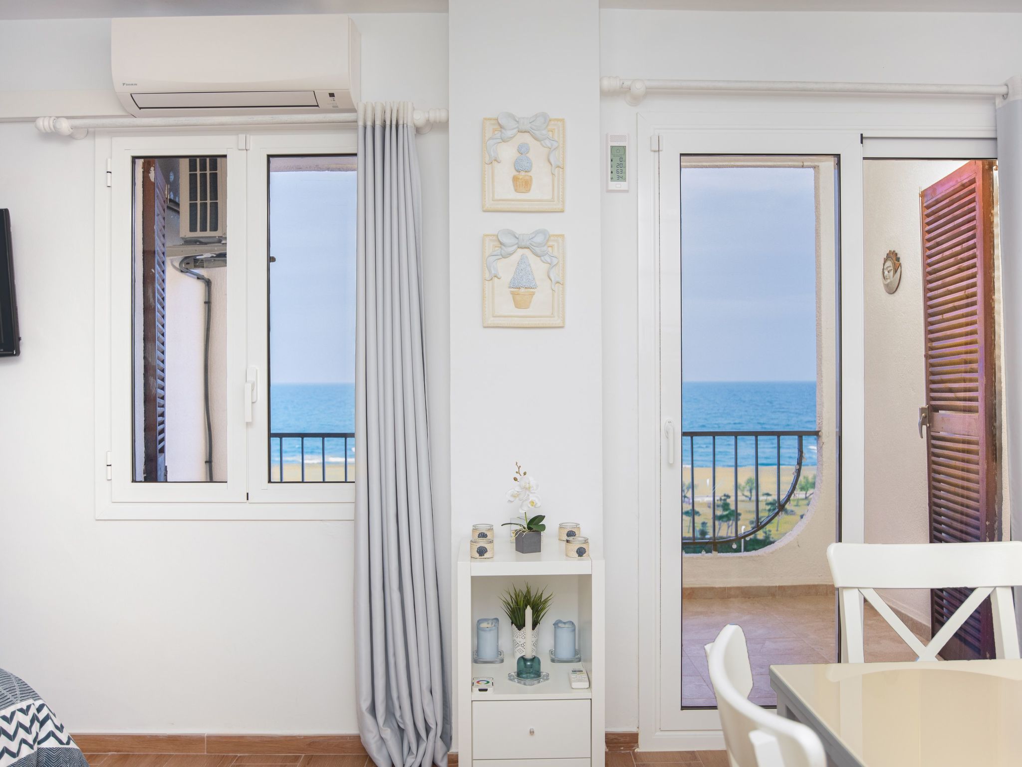 Photo of Appartement mit überdachtem Balkon und Meerblick in Strandlage