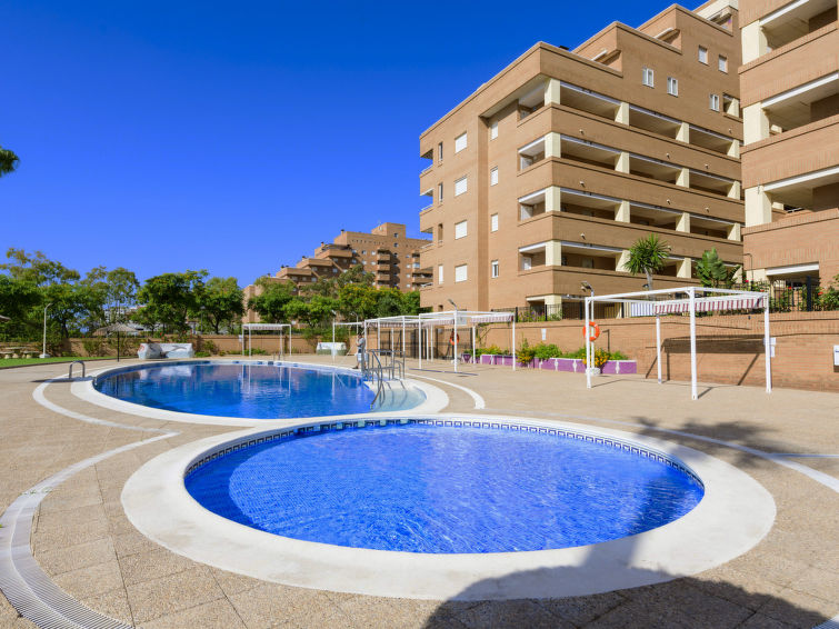 "Costa Caribe", appartement 3-kamers 50 m2 op de 2e verdieping. Licht, doelmatig en comfortabel ingericht: woon-/eetkamer met eettafel, Digitale TV, Flatscreen TV, air-conditioning en heteluchtverwarm..