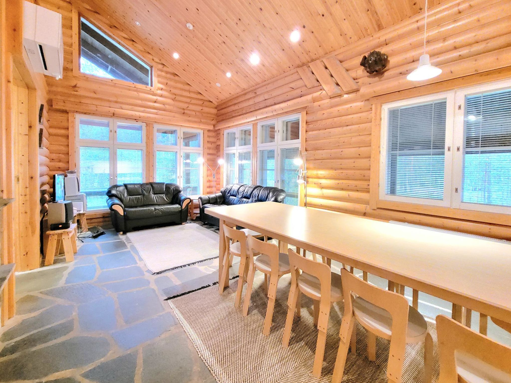 40km north of Kolari, Lake Ylläsjärvi 2 km, beach 3,5 km. 
Log cottage built in 1997. Combined kitchen-livingroom, 3 bedrooms with 2 beds each downstairs, 3 sleeping alcoves (curtains at the doorway..