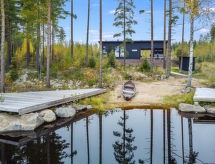 Duurzame houten villa aan het meer met sauna en eigen boothuis - thumbnail 1