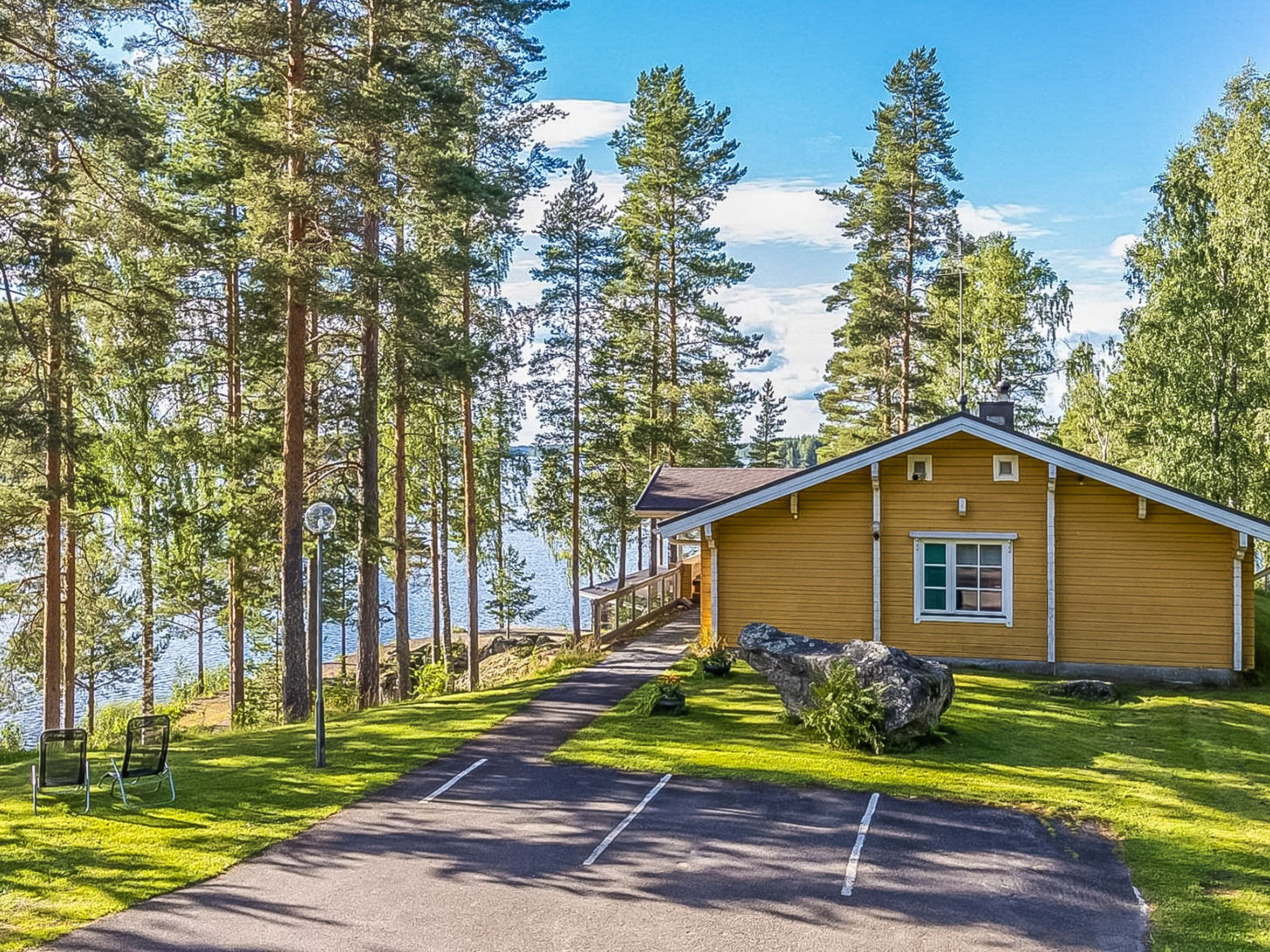 55 km south of Kuopio, beach 50 m away (Lake Kallavesi/Koirus/Konnusvesi), deep, hard bottom, water depth is 2 meters at the end of the pier, own boat. 
A spacious log villa on a peninsula, overlookin..