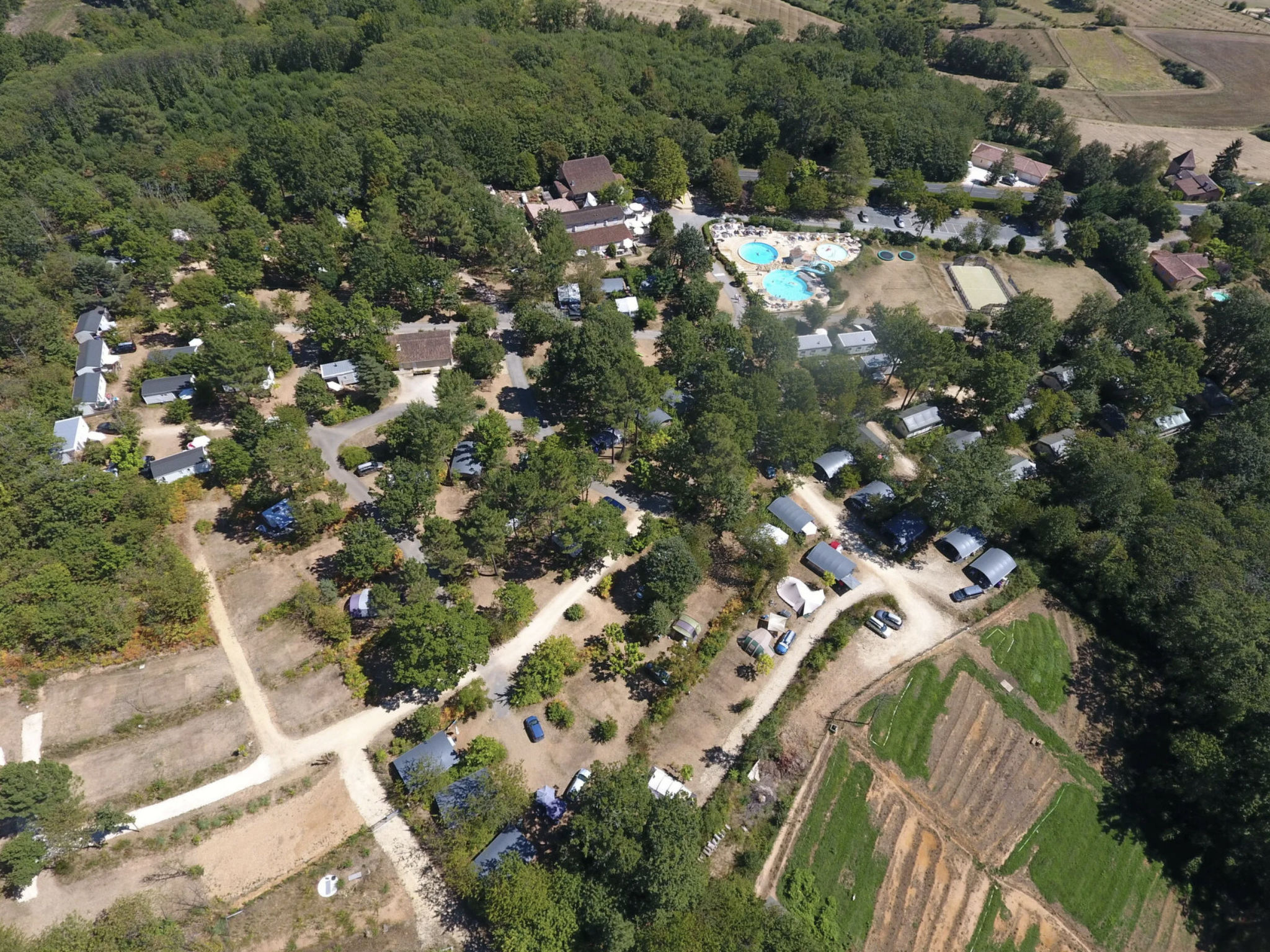 Camping Le Clou - Lodge de Luxe - Buiten