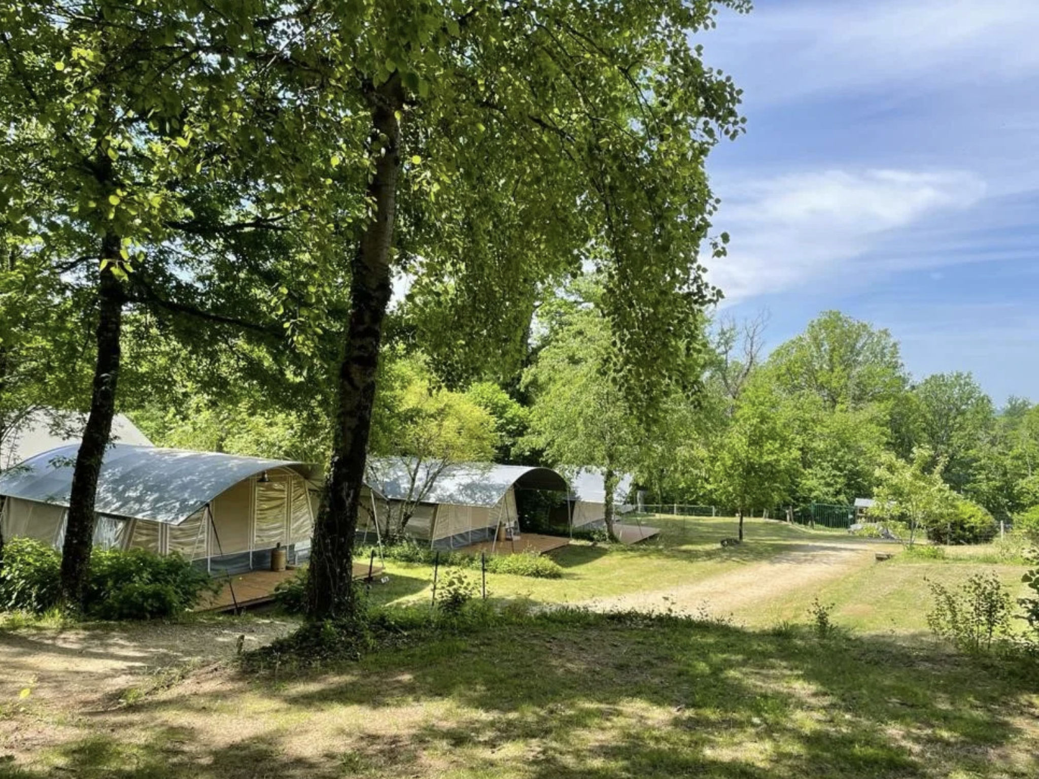 Camping Le Clou - Lodge de Luxe - Buiten