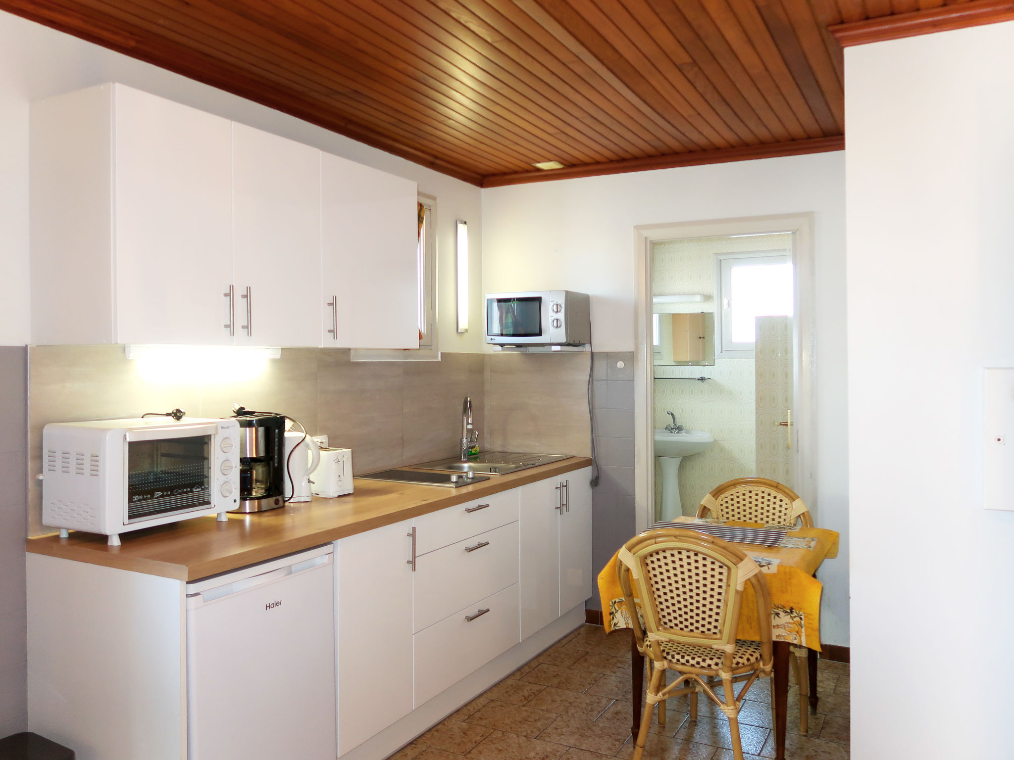Appartement Le Soleil Camarguais – Cuisine et coin repas, photo 11 sur 21
