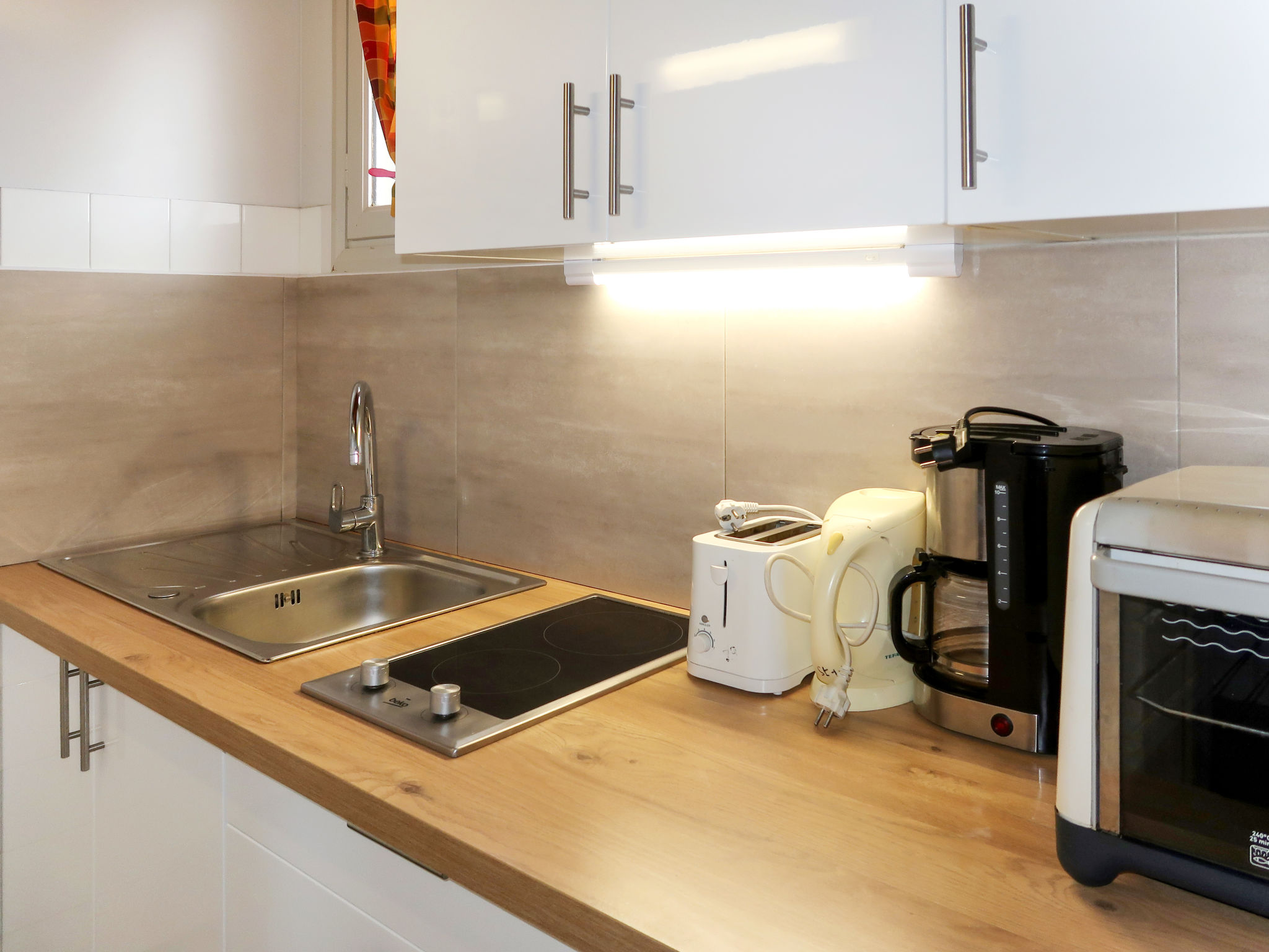 Appartement Le Soleil Camarguais – Cuisine et coin repas, photo 6 sur 21