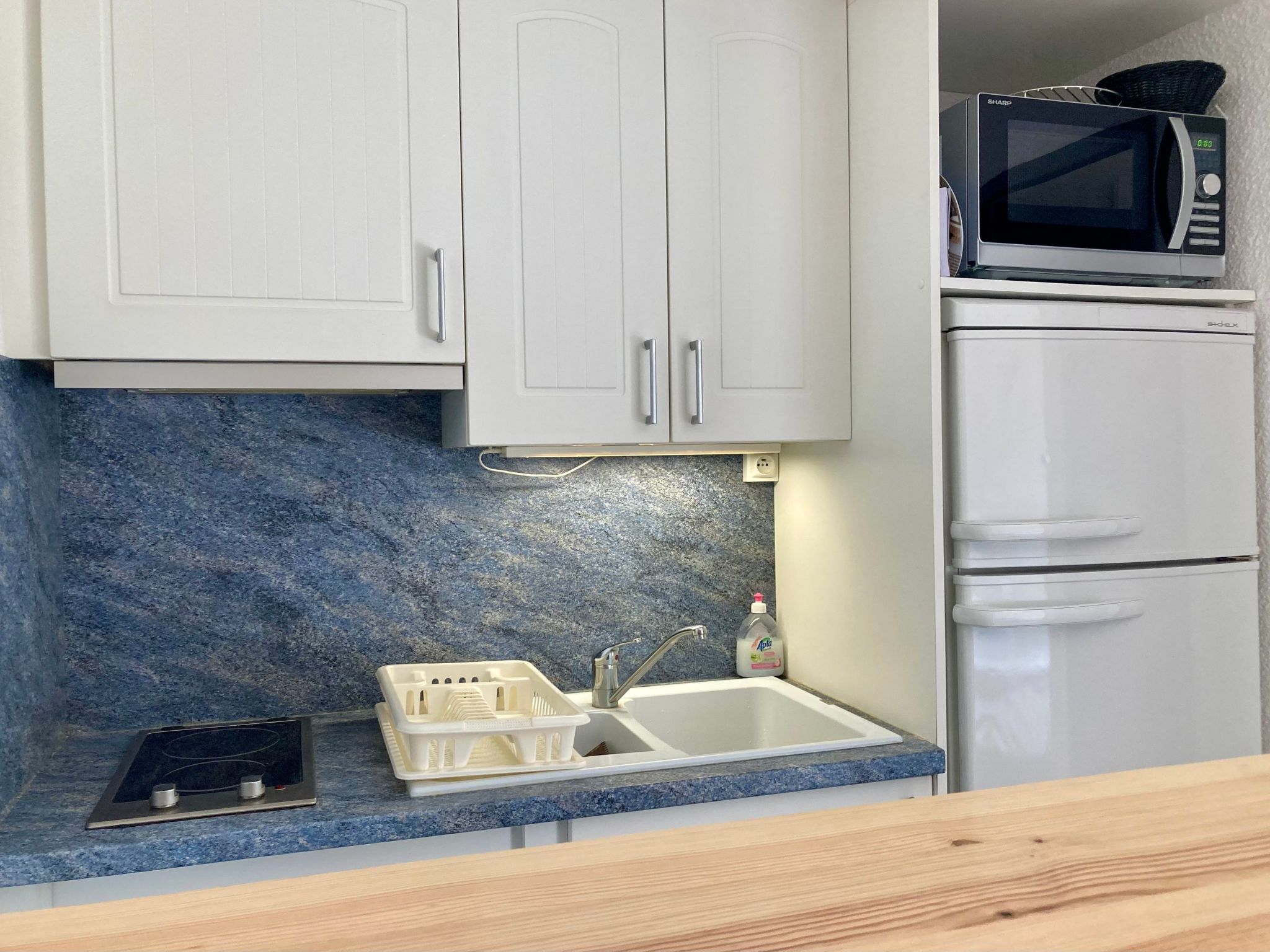 Photo of Gartengeschoss in der Nähe von Strand und Hafen