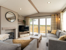 Vrijstaand chalet in Boat of Garten, aan de golfbaan en vlakbij het meer - thumbnail 1