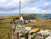 Vrijstaande cottage Tulum Bay nabij zee in rustig Duntulm, North Skye - thumbnail 1