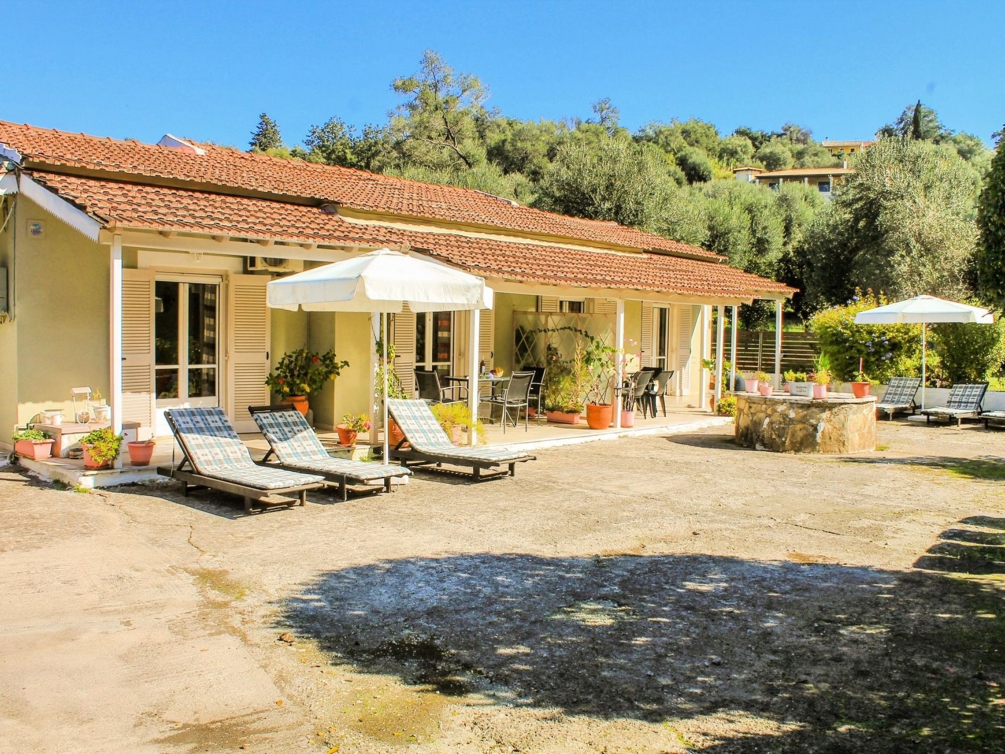 Amalia Ena is a two-bedroom apartment located within walking distance from Agios Spyridon N/E Beach and the Nature Reserve of Antinioti Lake, close to Perithia Corfu, and only five minutes by car from..