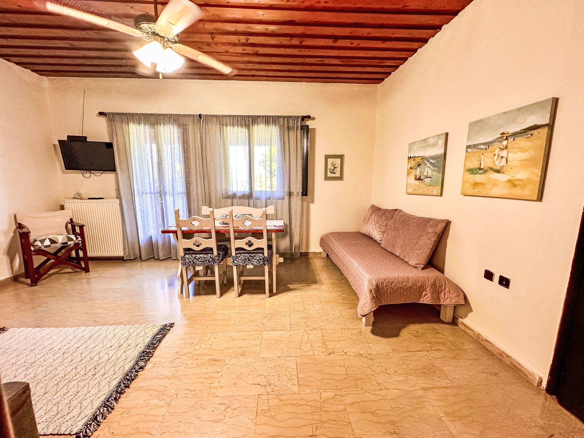 Apartment mit Meer- und Gartenblick - Genari Beach - Dedans