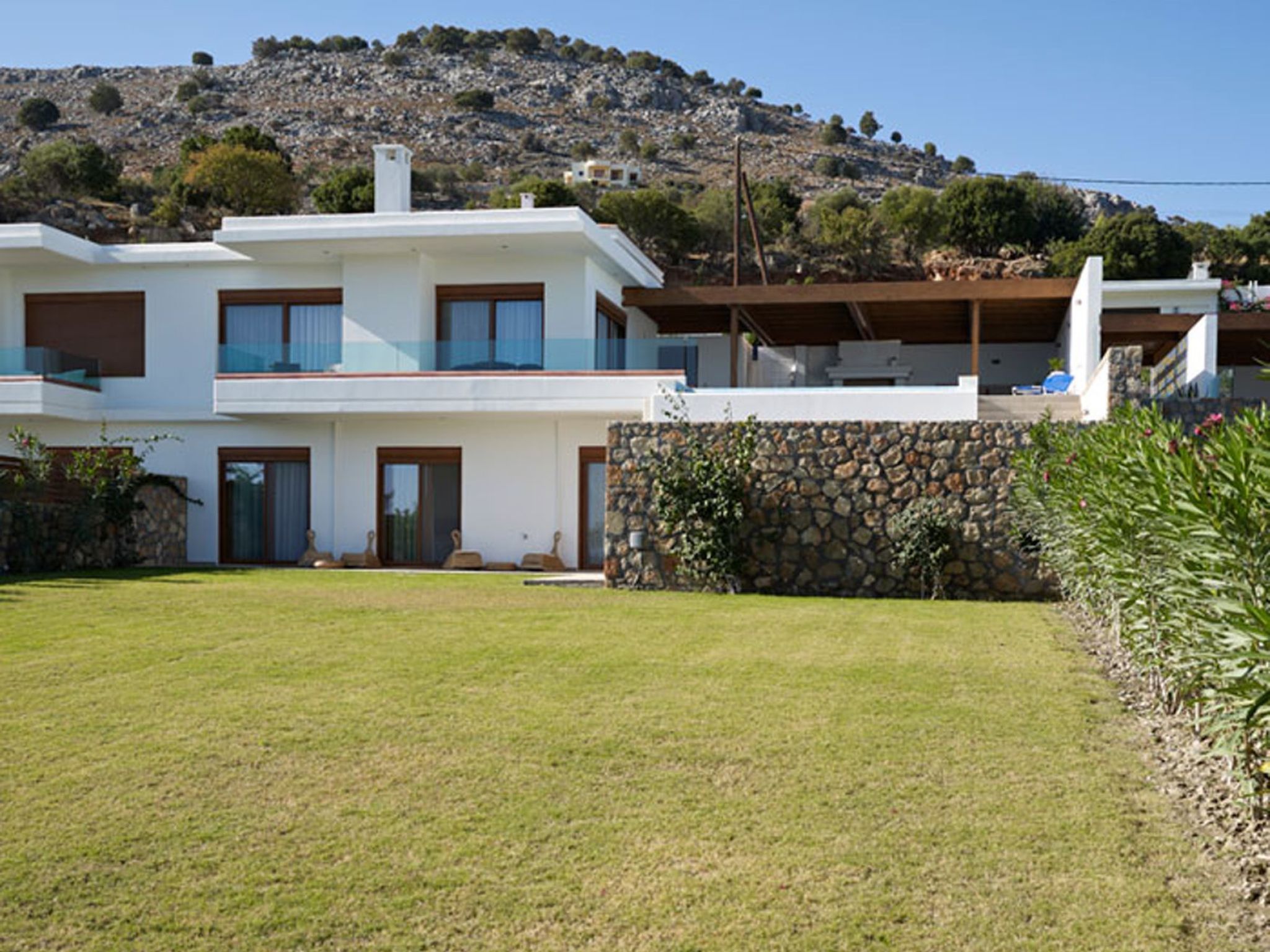 Haus in Vlycha Beach mit Infinity-Pool - Buiten