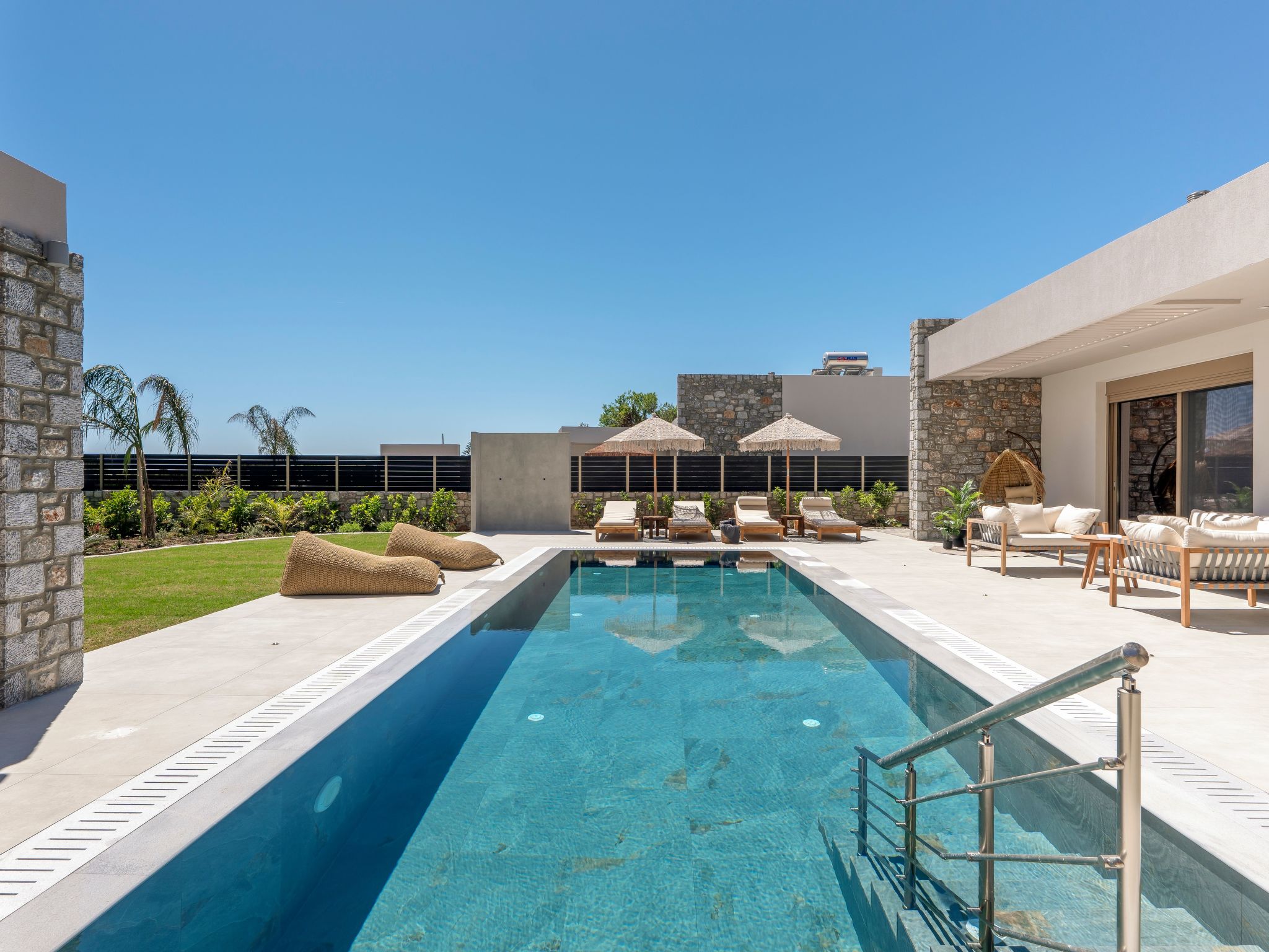 Welcome to Emerald Estate, your serene retreat on Rhodes Island. Nestled in the picturesque area of Sgourou, just a 10-minute drive from Rhodes City, this stunning villa offers the perfect combination..