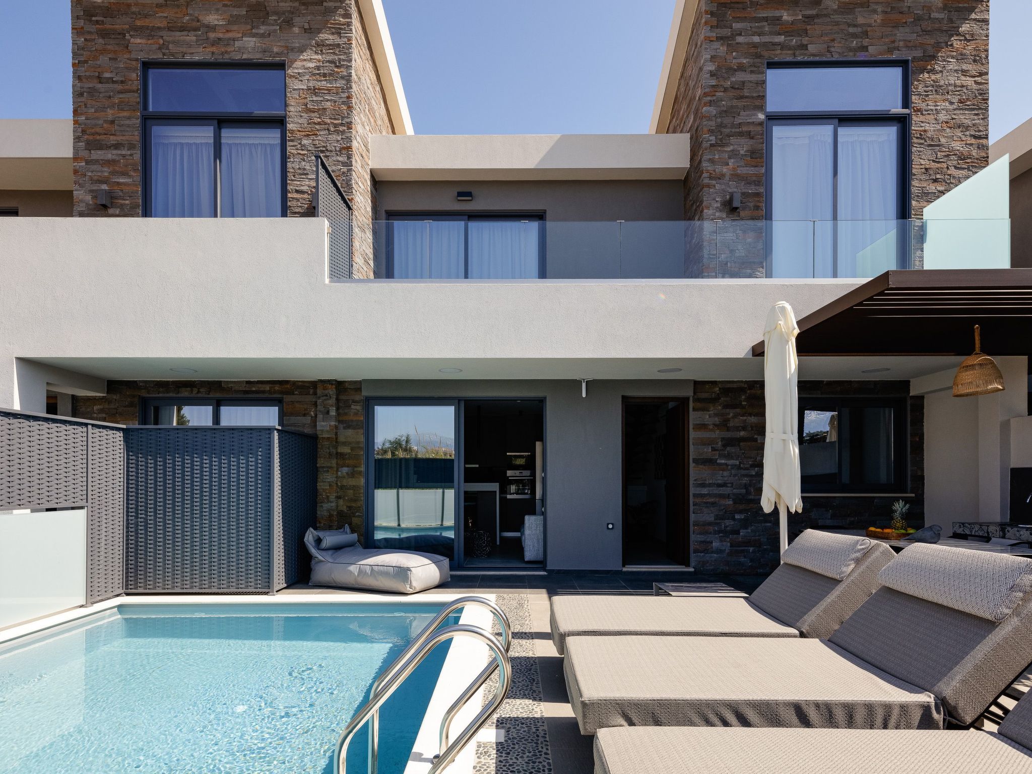 VillAgioi Villa II is a stylish two-story luxury villa, located only 450 meters from the sandy beach of Agioi Apostoloi. Designed with families and small groups in mind, this villa offers a private po..