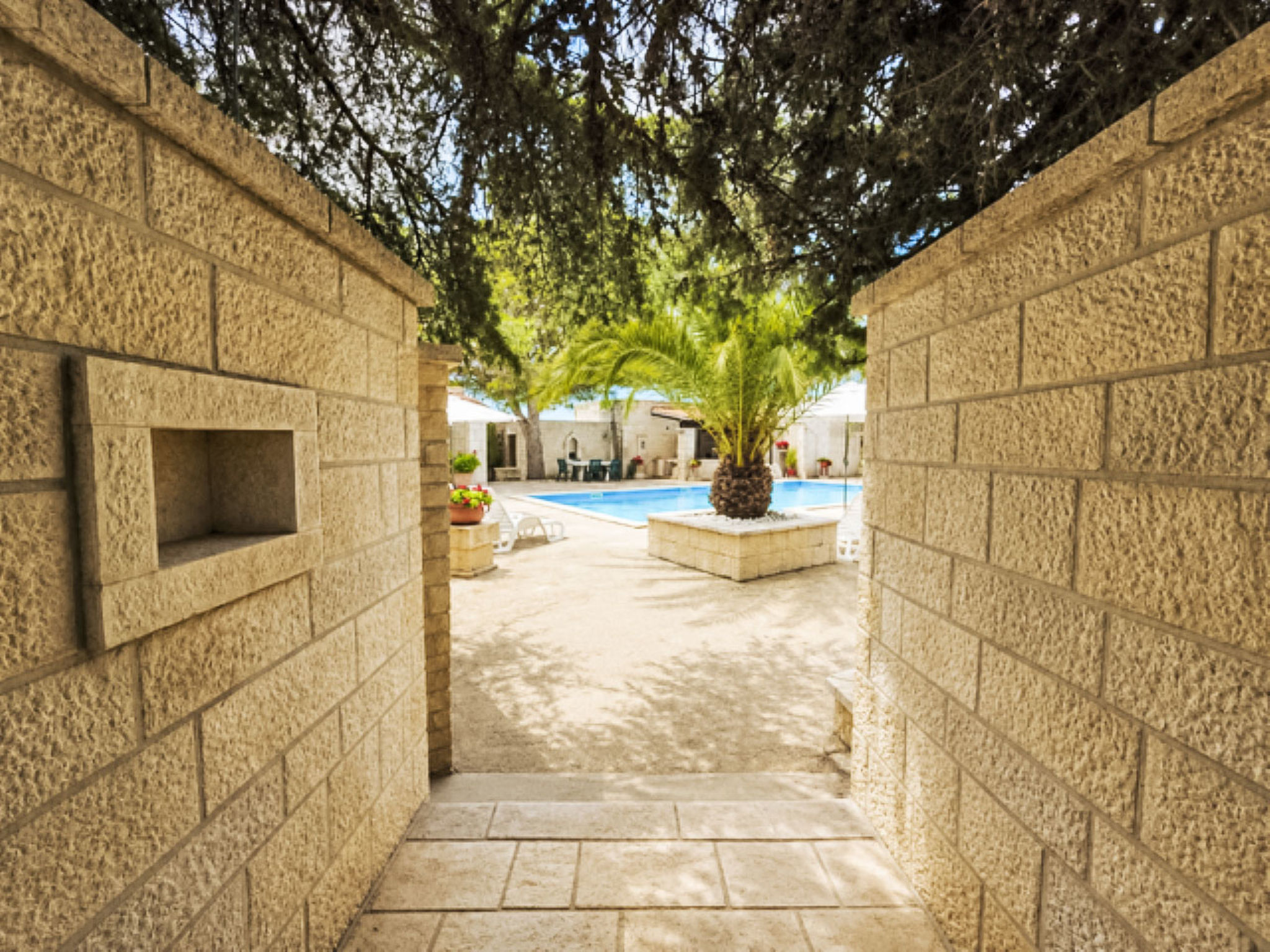 Wohnung mit Schwimmbad - Buiten