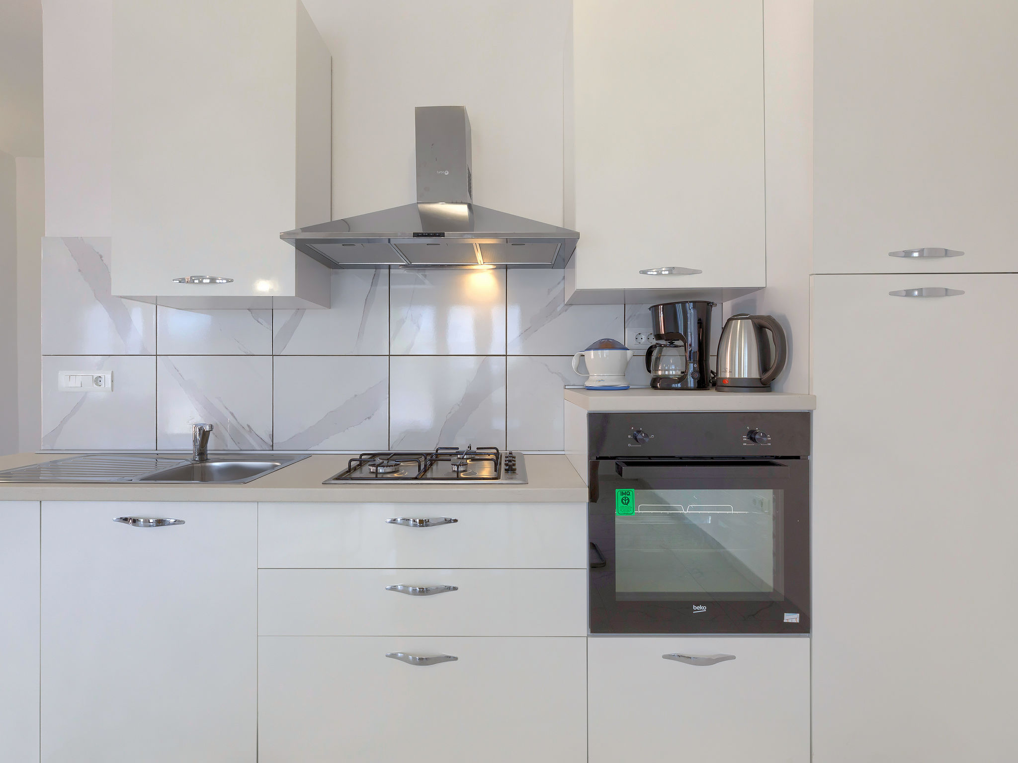 Maison Mia – Cuisine et coin repas, photo 23 sur 36