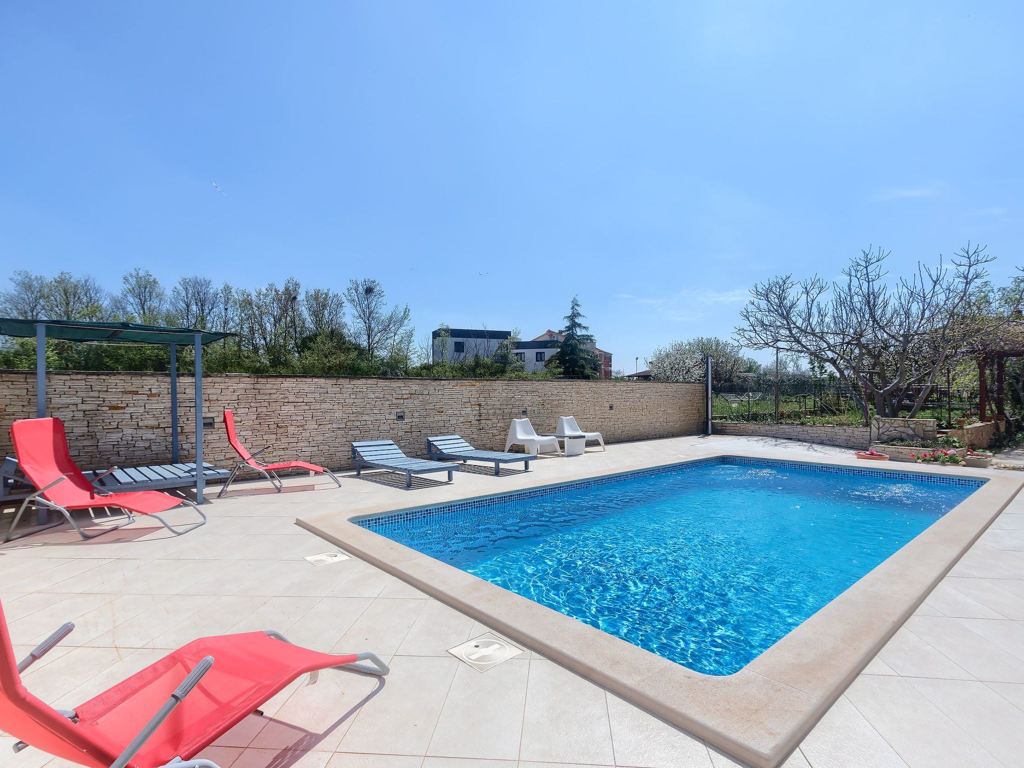 Wohnung in Fažana mit gemeinsamem Pool und Garten-Binnen