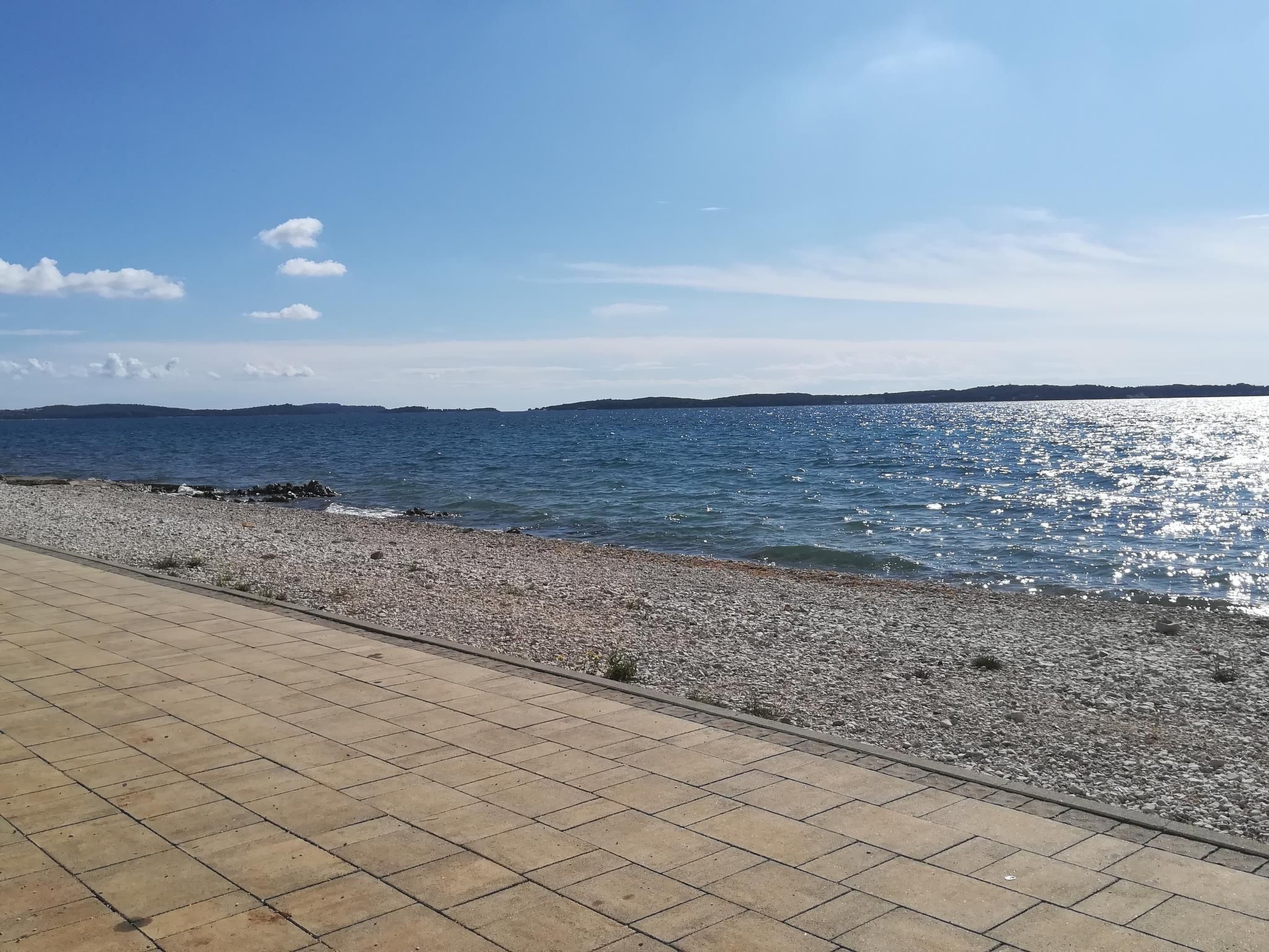 Photo of Perojka, 1 km vom Strand entfernt