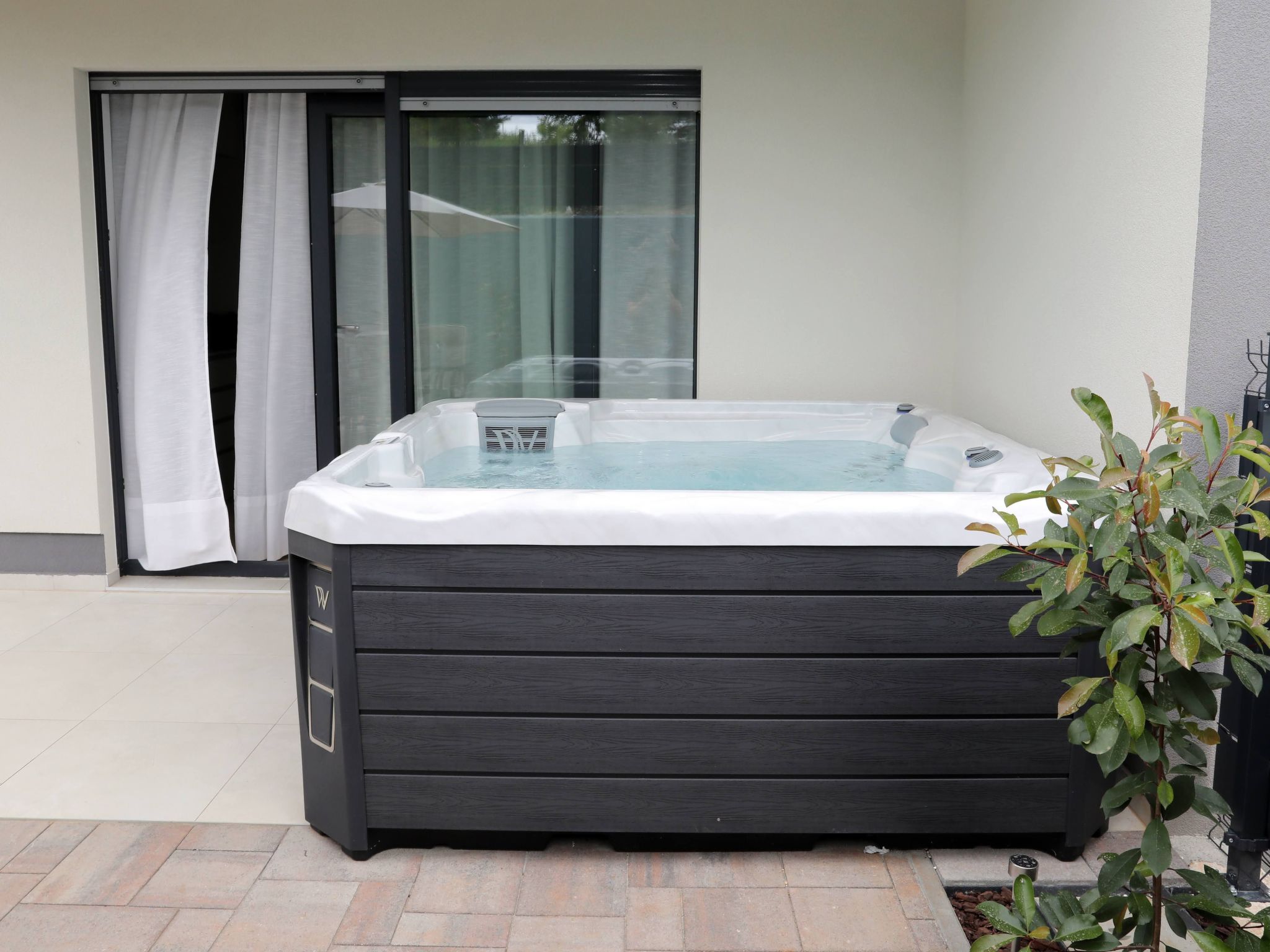 Photo of Luxus-Appartement mit Jacuzzi, Parkplatz und Garten